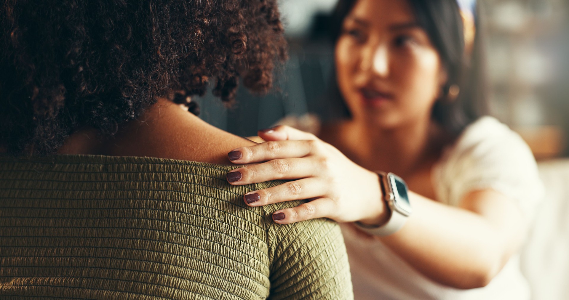 Friends, women and hands on shoulder for support with breakup, depression and relationship advice. Empathy, compassion and person with comfort for stress, overthinking and mental health in apartment