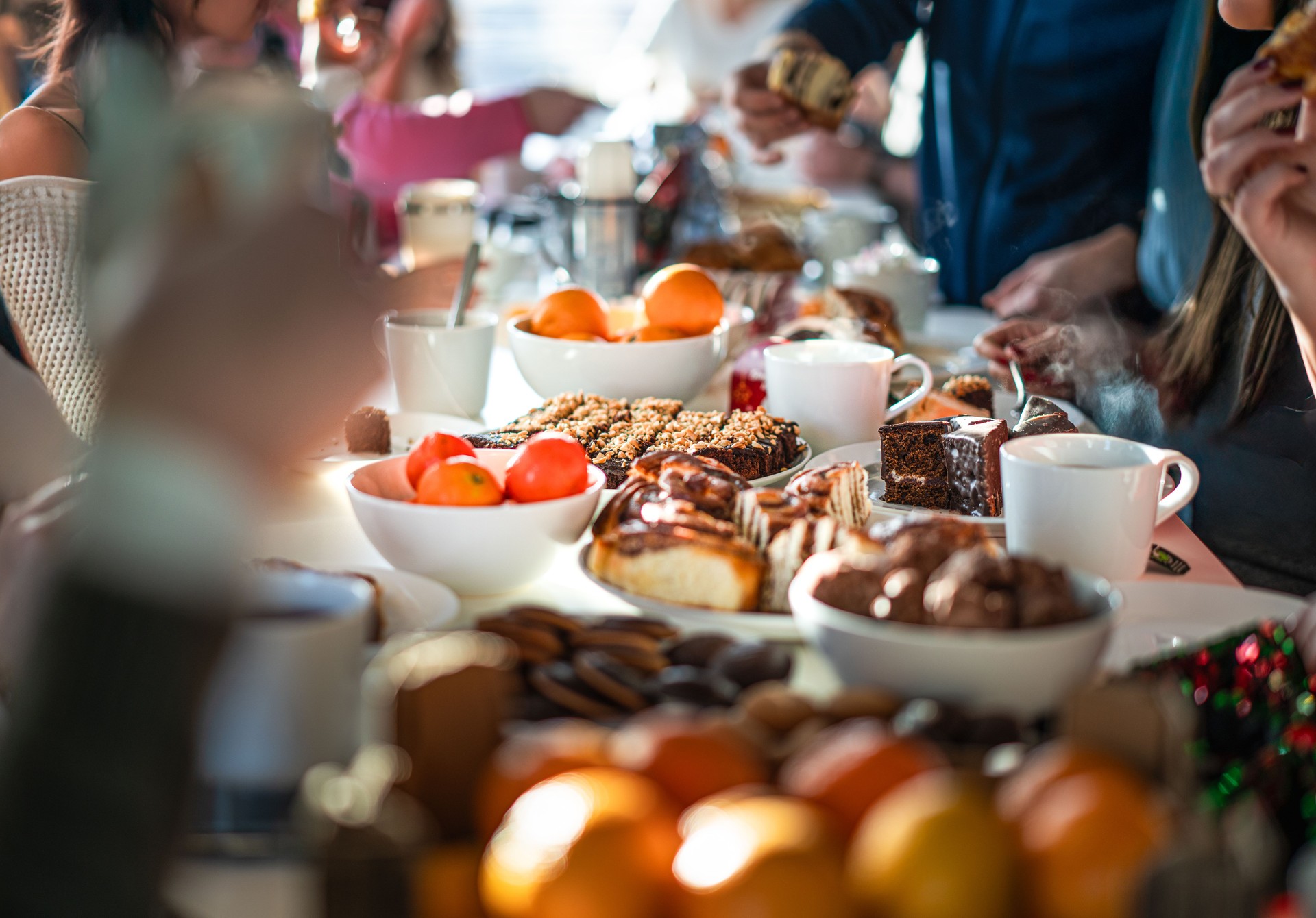 office celebration lunch table with food